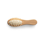 DERN. Wooden hairbrush with round bamboo bristles