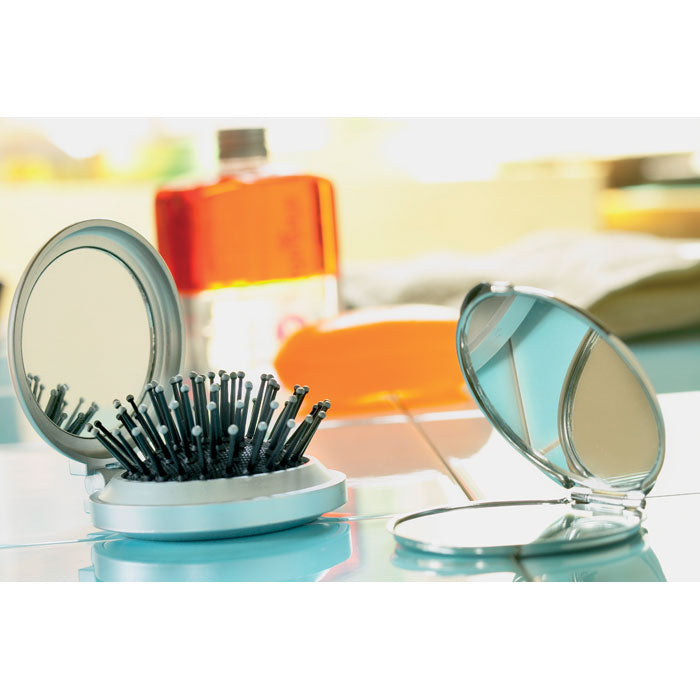 Foldable brush/mirror