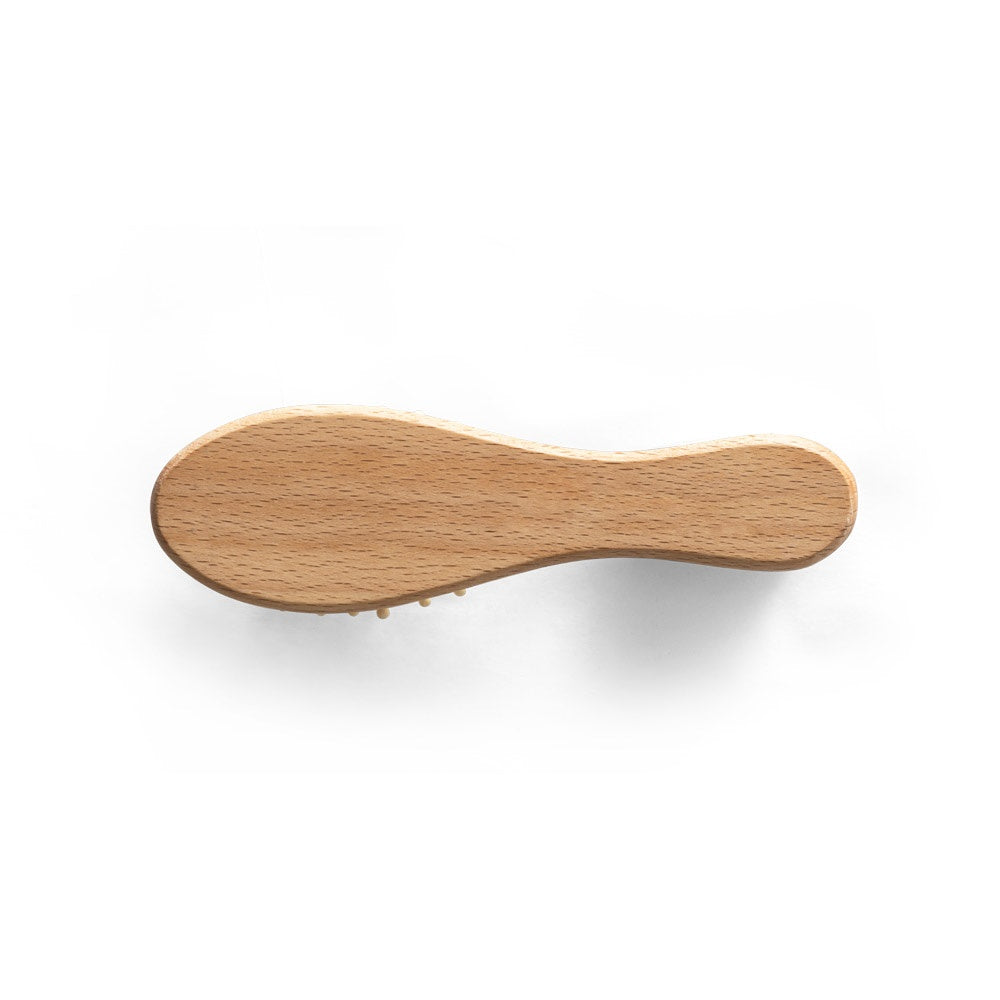 DERN. Wooden hairbrush with round bamboo bristles