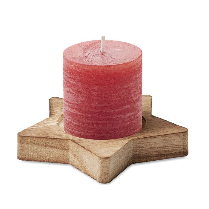 Candle on star shaped wooden base