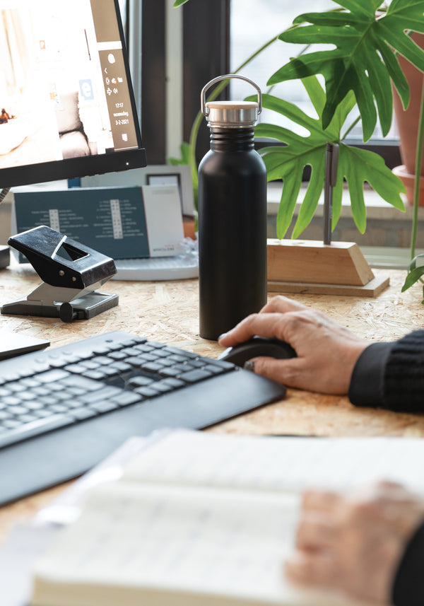 Modern stainless steel bottle with bamboo lid