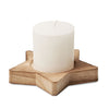 Candle on star shaped wooden base