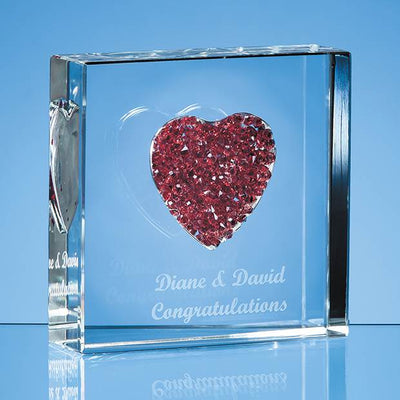 Clear Glass Paperweight boasting heart shape cutout filled with Red crystals featuring etched message