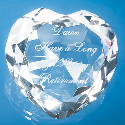 8cm Crystal Clear heart shaped paperweight, exaggerating the heart shaped diamond cut.
