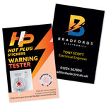 A double-sided business card with a Hot Plug safety sticker.