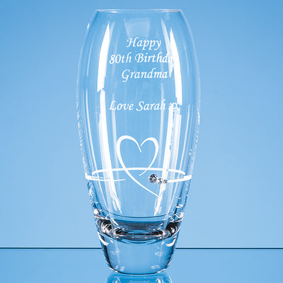 Glass Vase with heart design cut, featuring Swarovski crystals bonded to the glass. Branded with message to loved ones.