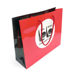 mall Laminated Gift Bag - Landscape with a red front and black sides. Branded to the front