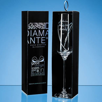 Champagne Flute with Heart shaped cut, featuring Swarovski crystals bonded to the glass. Accompanied with attractive gift box.