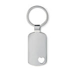 Metal key ring with heart detail on the bottom.