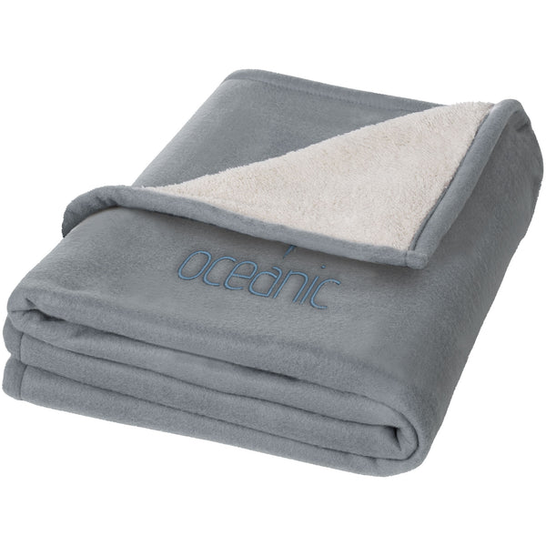 Branded Springwood soft fleece and sherpa plaid blanket