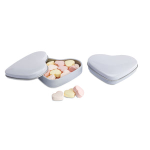 White Heart shaped tin featuring heart shaped candy